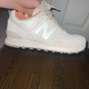 New balance worn very few times, size 7.5, orange inside, blue on the N